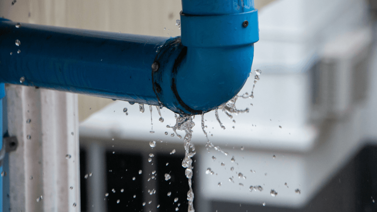 There is an image of water leaking from a pipe.